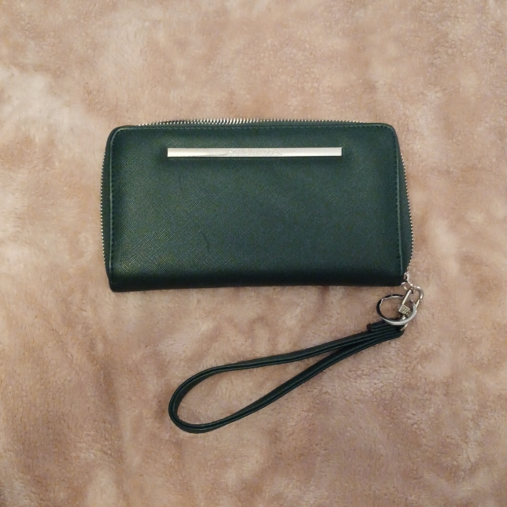 Wrist held wallet